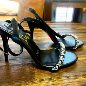 Summer black sandals . Size 8.5 . Never worn . Red bottom.